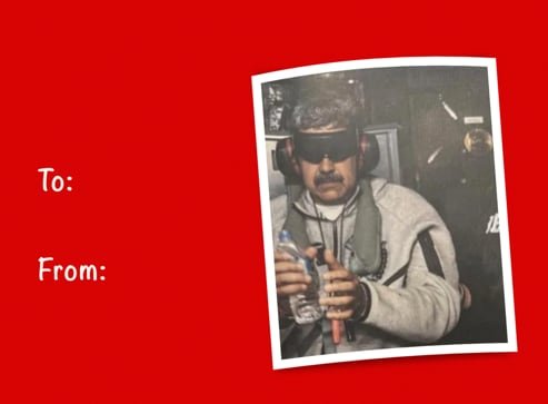 La postal incluye una imagen del expresidente de Venezuela con los ojos vendados